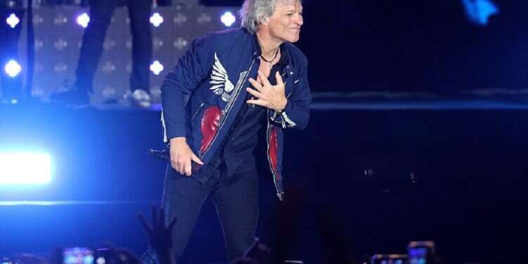 True guitar hero: Jon Bon Jovi aids distressed woman on Nashville bridge