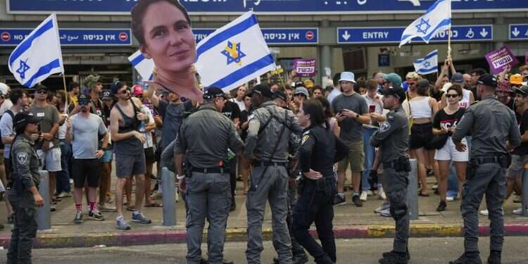 Demonstrators across Israel blocked intersections and key venues in solidarity with the hostages held by Hamas in Gaza Court ends nationwide solidarity strike; Ben Gurion flights to continue