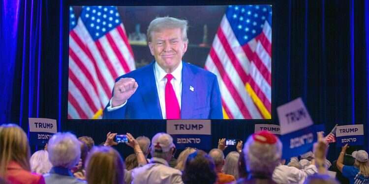 Republican presidential nominee Former President Donald Trump appears via a live satellite video feed during the Republican Jewish Coalition annual leadership summit Thursday, Sept. 5, 2024, in Las Vega Trump: If you vote Democrat, Israel will no longer exist