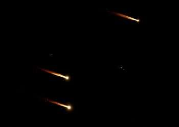 Israel vows harsh retaliation after Iran fires 180 missiles