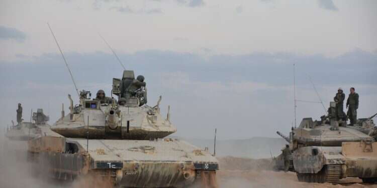 Israeli tank and soldiers in Sde Boker, Dec. 17, 2018 LIVEBLOG: Israel vows harsh retaliation after Iran fires 180 missiles