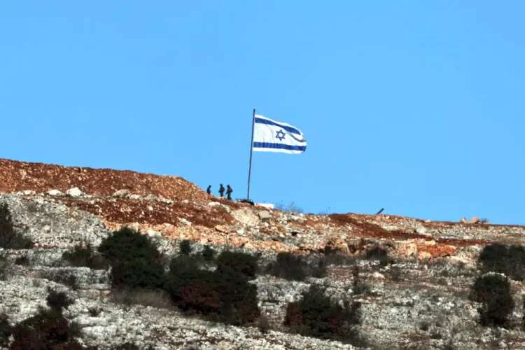The Israeli flag in the village of Maroun al-Ras, southern Lebanon. Photo: EPA