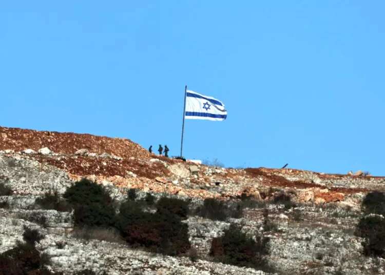 The Israeli flag in the village of Maroun al-Ras, southern Lebanon. Photo: EPA Israel-Lebanon agreement may turn into strategic trap
