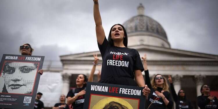 Iranian woman defies morality police, strips in public