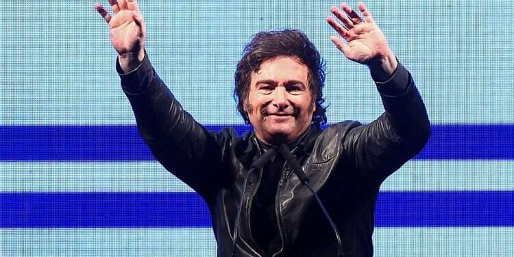 Argentine President Javier Milei gestures onstage during a rally to launch his party, La Libertad Avanza, nationally, in Buenos Aires, Argentina September 28, 2024 Argentina's president swears in minister on Torah scroll