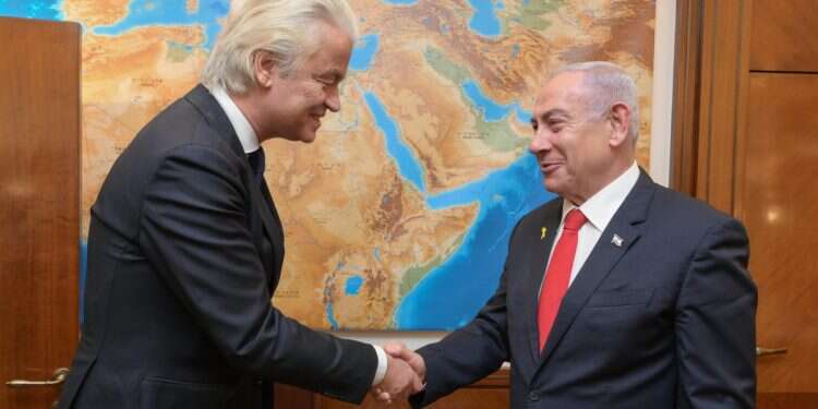 Israeli Prime Minister Benjamin Netanyahu (R) shaking hands with the Dutch right-wing politician Geert Wilders, in Jerusalem, Israel, 09 December 2024 'Europe's Trump' receives award during Israel visit