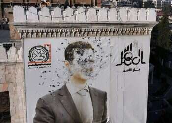 A bullet-riddled portrait of Syrian President Bashar Assad adorning Hama's municipality building after it was defaced following the capture of the city by anti government fighters, on December 6, 2024 What's next for Syria?