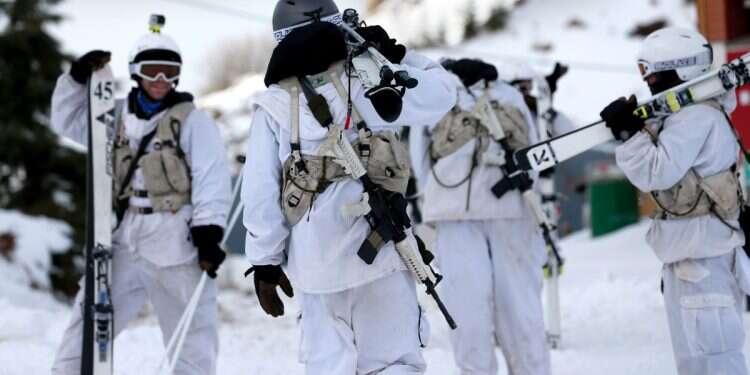 Israeli soldiers of the Alpinist Unit patrol on ski at the Israeli Mount Hermon ski resort, in Golan Heights, on January 21, 2016 Syria war's upside: Ski resort's CEO dreams of expanding Hermon site