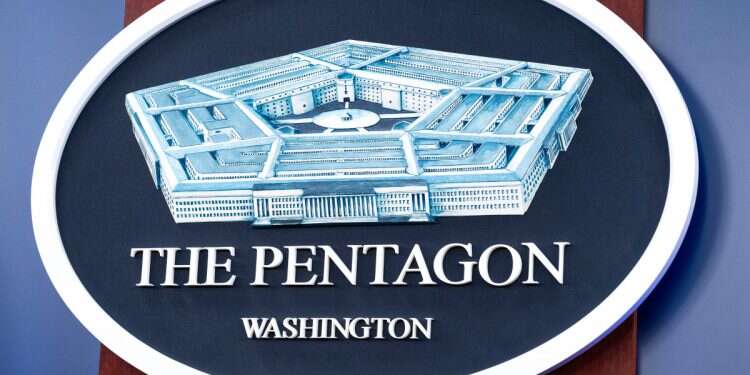 The Department of Defense logo is seen on the wall in the Press Briefing room at the Pentagon, Oct. 29, 2024 in Washington Mystery drones over New Jersey not linked to Iran, Pentagon says