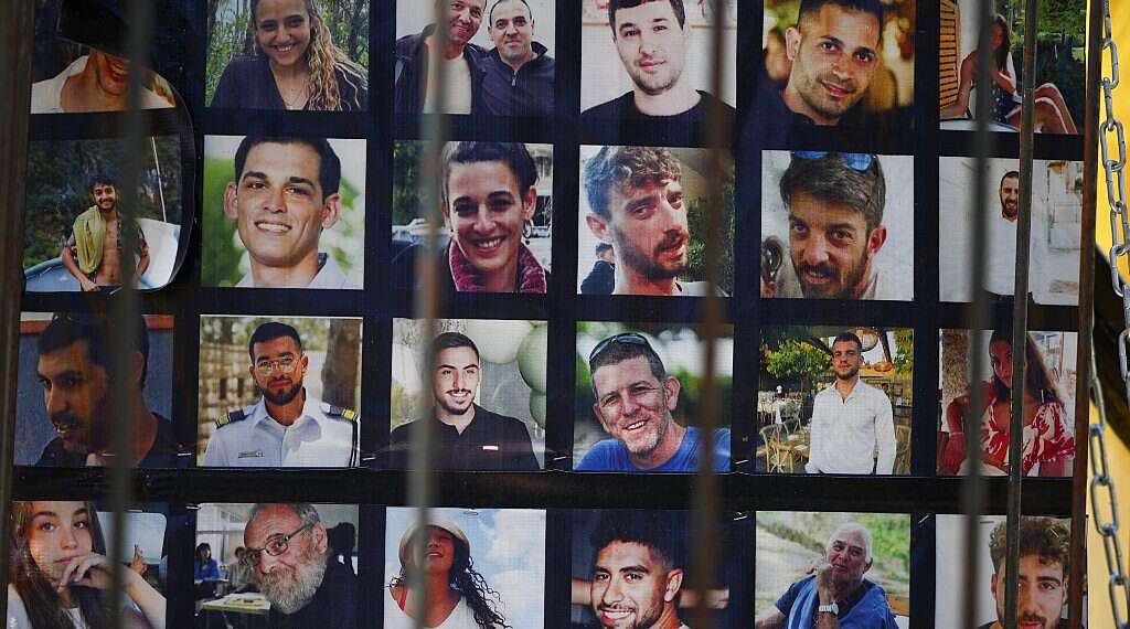 A view of pictures of hostages who were kidnapped during the Oct. 7 massacre. Photo: Reuters/Florion Goga Report to UN on released hostages reveals torture, starvation, sexual assault at gunpoint