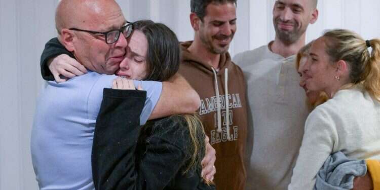 Released Doron Steinbrecher embraces loved ones at Sheba Medical Center in Ramat Gan, Israel, after being held in Gaza since the deadly Oct. 7, 2023 attack by Hamas. Photo credit: Maayan Toaf/GPO via Reuters 'Part of them is still in that tunnel': Released hostages begin complex recovery