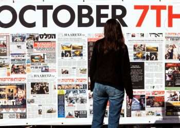 A woman looks on an installation marking the release of hostages kidnapped during the deadly October 7, 2023 attack by Hamas, at the Hostages Square in Tel Aviv, Israel, January 20, 2025 A heart divided