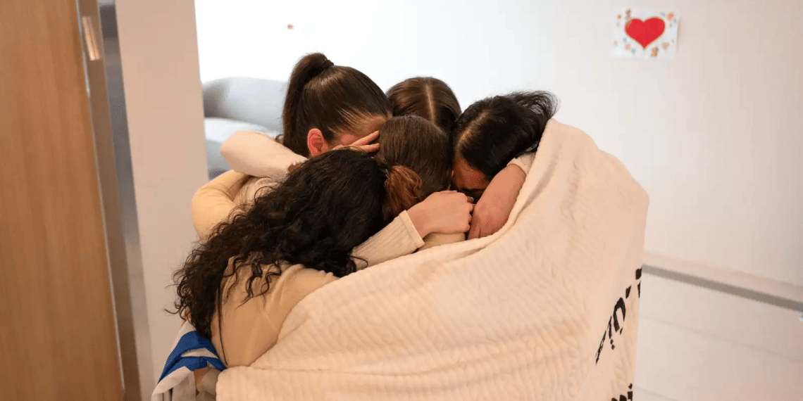 IDF observer Agam Berger reunites with fellow hostages Karina Ariev, Liri Albag, Naama Levy and Daniella Gilboa. Photo credit: IDF 'Now our heart is full': The 5 observers' emotional reunion