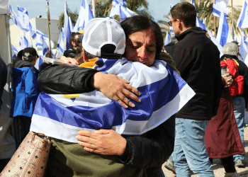 Heartbreaking homecoming: Israelis defy weather to embrace hostages