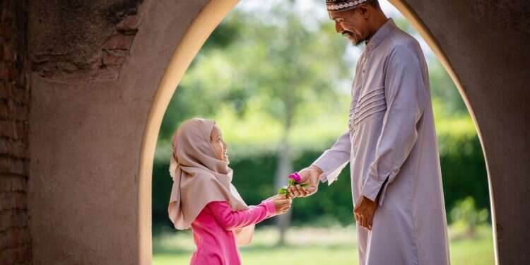 Why are Israeli children obsessed with an Islamic ritual device? Pictured: A Muslim man and child Toying with religion: Israeli children's latest craze involves Islamic prayer ritual