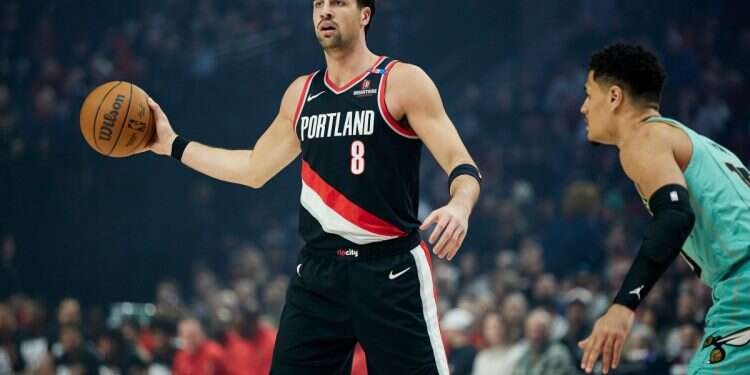 Portland Trail Blazers forward Deni Avdija, left during the first half of an NBA basketball game in Portland, Ore., Saturday, Feb. 22, 2025 'I love Israel': Deni Avdija opens up on his NBA stardom