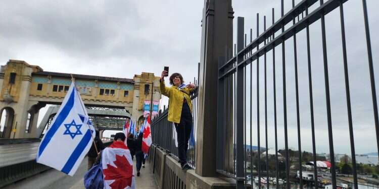 Unity in rain: Vancouver's Israel allies mark 18 months since Oct. 7