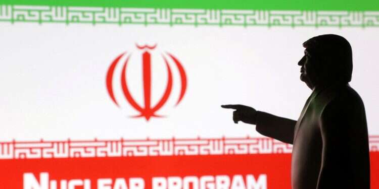 A 3D-printed miniature model depicting US President Donald Trump, Iran flag and a word 'Nuclear program' in this illustration taken, April 17, 2025 Trump signals breakthrough on Iran deal 'without having to drop bombs'