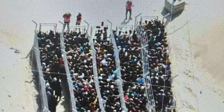 Gazans storm humanitarian aid center Thousands of Gazans storm aid distribution center