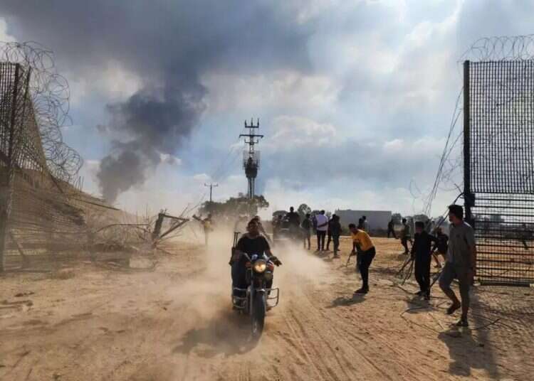 The Gaza border fence is breached by Hamas bulldozers on October 7 Hasbara in crisis: How the October 7 massacre is being forgotten