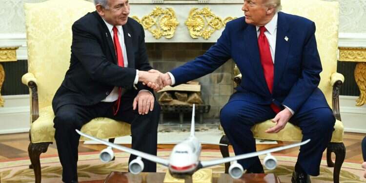 US President Donald Trump shakes hands with Israeli Prime Minister Benjamin Netanyahu during a meeting in the Oval Office of the White House in Washington, DC, on April 7, 2025 Israel's red lines with Trump are vital for survival