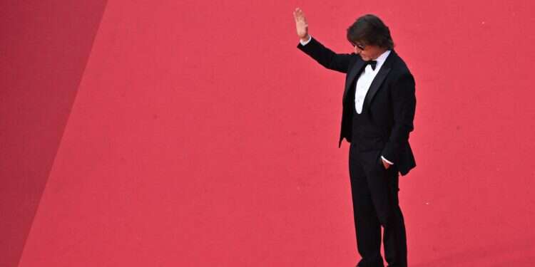 US actor and producer Tom Cruise arrives for the screening of the film 'Mission: Impossible - The Final Reckoning' at the 78th edition of the Cannes Film Festival in Cannes, southern France, on May 14, 2025 Tom Cruise's Mission Impossible: Escaping unflattering viral photo