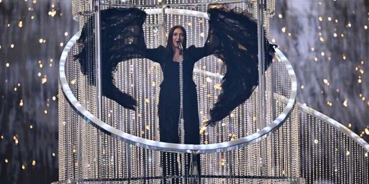 TOPSHOT - Israeli singer Yuval Raphael representing Israel with the song 'New Day Will Rise' performs during the second semi-final of the Eurovision Song Contest 2025, at the St. Jakobshalle arena in Basel on May 15, 2025. (Photo by Fabrice COFFRINI / AFP) Could Israel be banned from Eurovision?