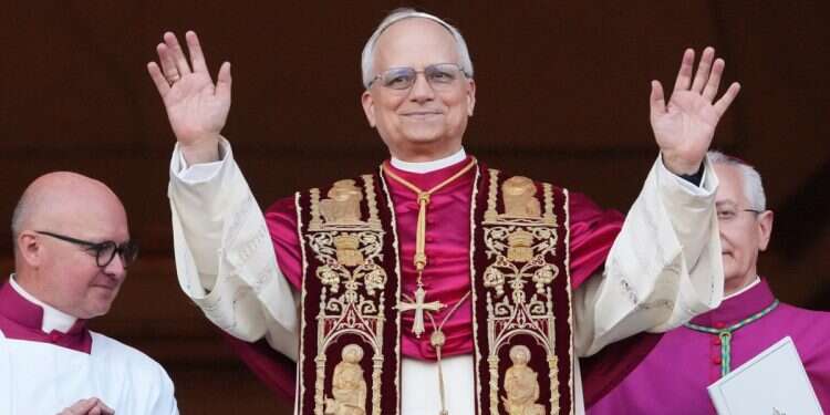 Pope Leo XIV appears on the central loggia of St. Peter's Basilica after being chosen the 267th pontiff of the Roman Catholic Church, at the Vatican, Thursday, May 8, 2025 History in Vatican as American becomes pope