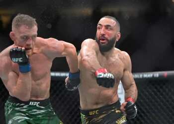 UFC champion enters ring draped in PLO flag – and loses