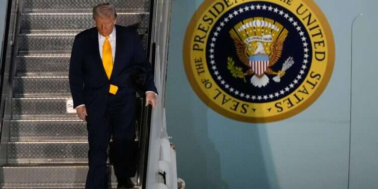 President Donald Trump arrives on Air Force One at Miami International Airport, Saturday, April 12, 2025, in Miami, Fla. Israel closely monitors Mideast summit as hostage deal hangs in balance