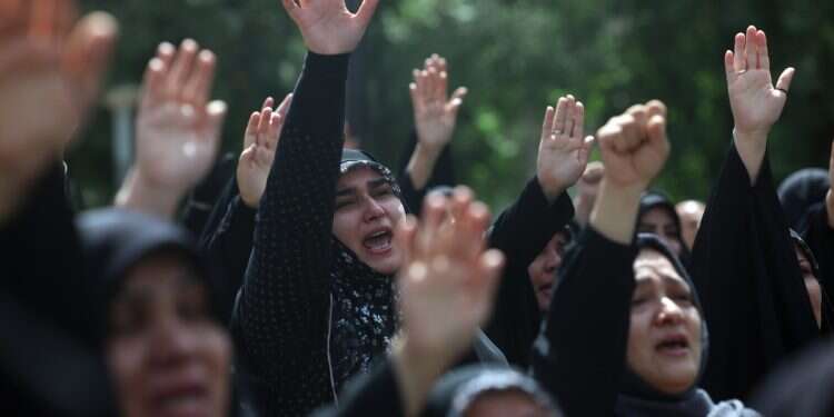 Iranian women mourn during the funeral ceremony of Iranian soldier Mahan Setareh, who was killed in a recent Israeli airstrike, in the capital city of Tehran, Iran, 26 June 2025 (Photo: EPA/Abedin Taherkenareh) Israel launches 'Mossad Farsi' on X to help Iranians
