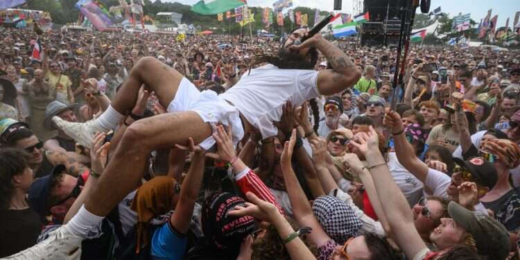 Bob Vylan crowdsurfs in front of the West Holts stage during day four of Glastonbury festival 2025 at Worthy Farm, Pilton on June 28, 2025 in Glastonbury, England 'Death to the IDF': Glastonbury music festival turns into antisemitic rally