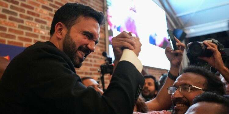 Zohran Mamdani greets a supporter during a watch party for his primary election, which includes his bid to become the Democratic candidate for New York City mayor in the upcoming November 2025 election, in New York City, U.S., June 25, 2025. REUTERS/David 'Dee' Delgado The apple falls: Intifada supporter poised to take over New York