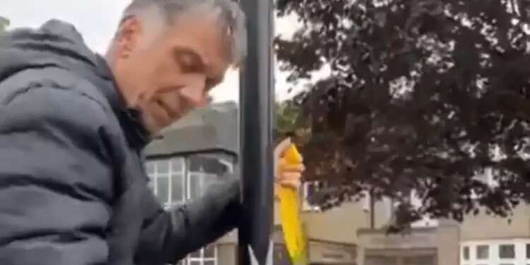 Yellow ribbons for hostages cut down in London Jewish neighborhood