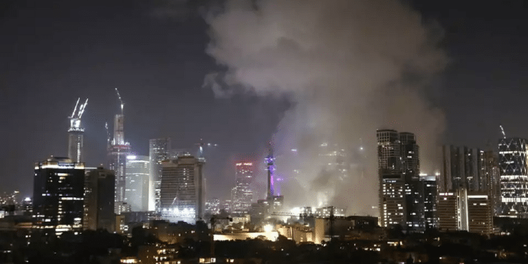 Iranian missile impact site in central Israel LIVE UPDATES: Israel strikes Iran