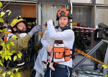 'My boy is fine!': Infant found in rubble after missile barrage