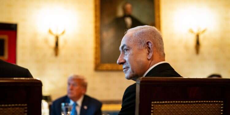 Prime Minister Benjamin Netanyahu looks on during a dinner with US President Donald Trump, in the Blue Room of the White House in Washington, July 7, 2025 Netanyahu, Trump poised to hold 2nd meeting this week