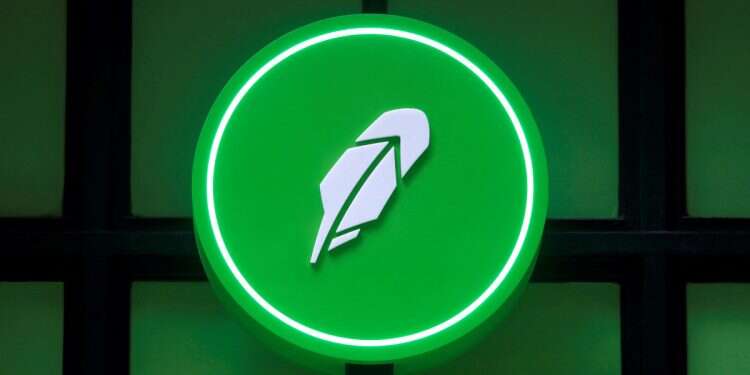 The logo of Robinhood Markets, Inc. is seen at a pop-up event on Wall Street after the company's IPO in New York City, US, July 29, 2021 OpenAI throws cold water on Robinhood's crypto party