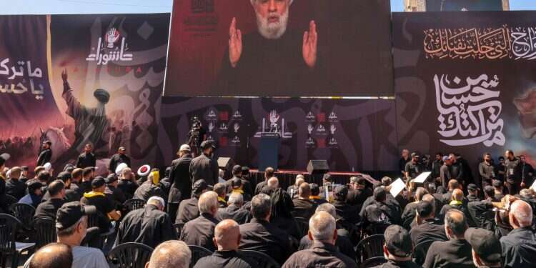 Lebanese Shiite Hezbollah supporters listen to a televised speech by the movemen't leader Naim Qassem, in Beirut's southern suburbs on July 6, 2025 Without Nasrallah and Iran funding, Hezbollah's empire crumbles