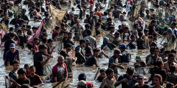 Passengers leap into sea as ferry engulfed in flames near Indonesia
