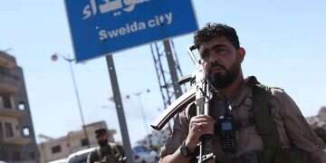 Syrian regime forces celebrate capture of Druze stronghold