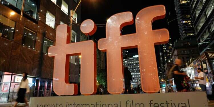 A sign for the Toronto International Film Festival appears on the opening night of the festival in Toronto on Sept. 5, 2024 Toronto film festival reverses decision to exclude Oct. 7 documentary