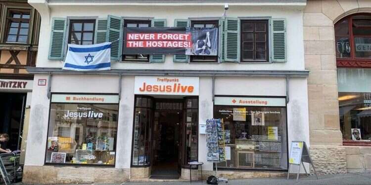 'Don't forget the hostages' banner was hung on the front of the TOS church and the adjacent conference center on Eisenbahnstraße street 'Never forget the hostages' banners raised in Nazi town
