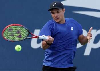 CEO apologizes after US Open hat-snatching