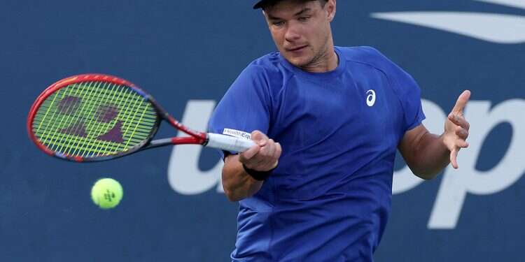 Kamil Majchrzak of Poland returns a shot against Karen Khachanov during their Men's Singles Second Round match on Day Five of the 2025 US Open at USTA Billie Jean King National Tennis Center on August 28, 2025 in the Flushing neighborhood of the Queens borough of New York City CEO apologizes after US Open hat-snatching