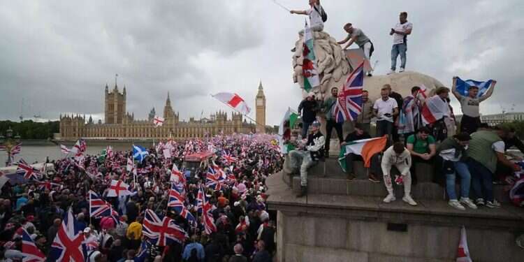 Thousands of anti-immigration protesters near the British Parliament in London. Photo: AP Mass anti-immigration protest sweeps London