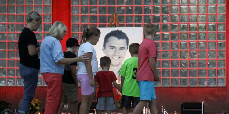 People attend a vigil at Orem City Center Park, after US right-wing activist and commentator, Charlie Kirk, was fatally shot during an event at Utah Valley University, in Orem, Utah,US September 11, 2025 'We have him': Alleged Kirk shooter caught