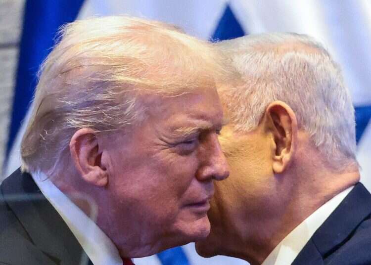 US President Donald Trump (L) speaks with Israeli Prime Minister Benjamin Netanyahu at the Israeli parliament, the Knesset, in Jerusalem on October 13, 2025 Trump stopped Israel 3 times; he did the right thing