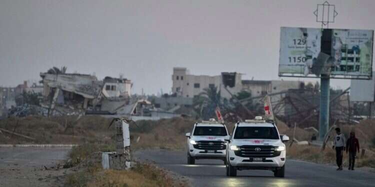 Red Cross vehicles carrying an Israeli hostage, May 12, 2025 Israel prepares for handover of 2 deceased hostages