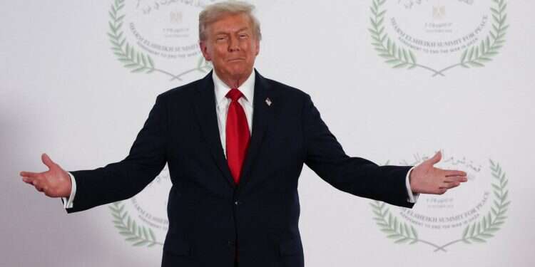 President Donald Trump waits to greet leaders during a summit to support ending the more than two-year Israel-Hamas war in Gaza after a breakthrough ceasefire deal, Monday, Oct. 13, 2025, in Sharm El Sheikh, Egypt Trump's Gaza plan financing in doubt as Gulf states push back